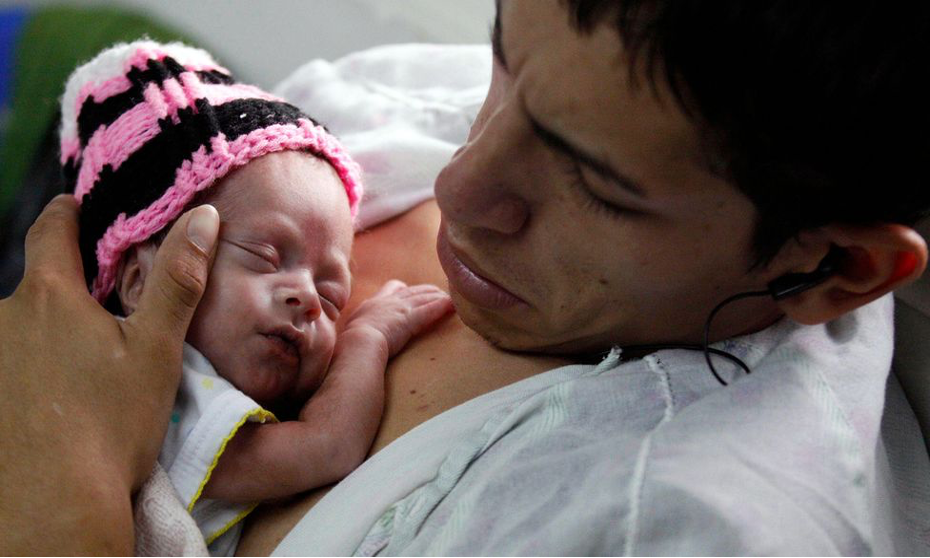 Fathers can take their share of skin-to-skin contact using kangaroo care with similar results to mothers (Credit: Alamy)