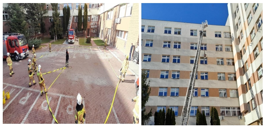 strażacy na zwyżce zaglądają do okien w szpitalu dziecięcym